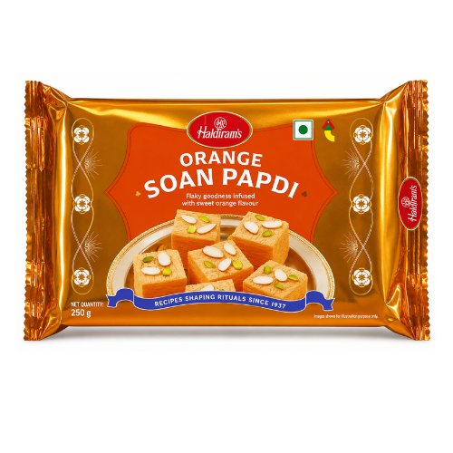 Haldiram's Orange Soan Papdi (Orange Soan Papdi / Santra Sweet) | 250g - Authentic Citrus Flavored Flaky Indian Dessert Treat | Melt-in-Mouth Fluffy Mithai for Festive Gifting, Celebrations & Teatime Snacks | South Africa | India Bazaar